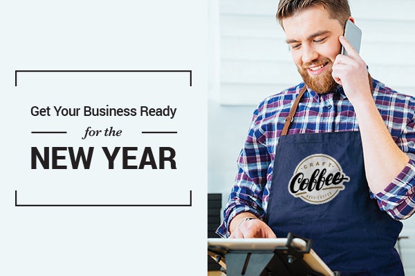 Cafe owner with iron-on logo on apron
