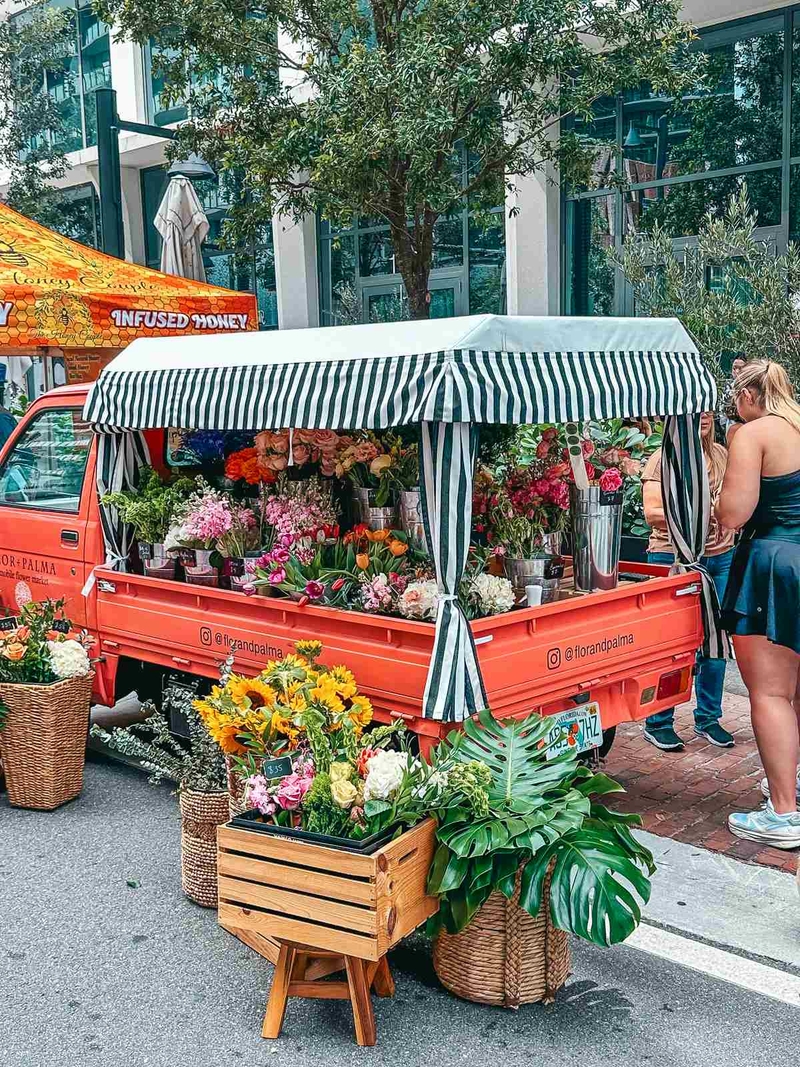 converted truck showcasing floral bouquets for sale 
