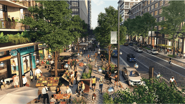 bustling downtown city street with outdoor patios and pedestrians 