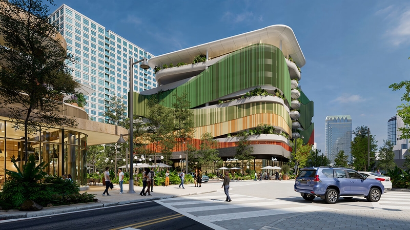 corner of a mixed used community neighborhood with a parking garage