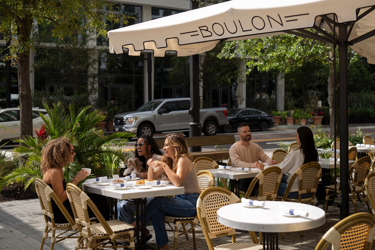 group of diners eating outdoors