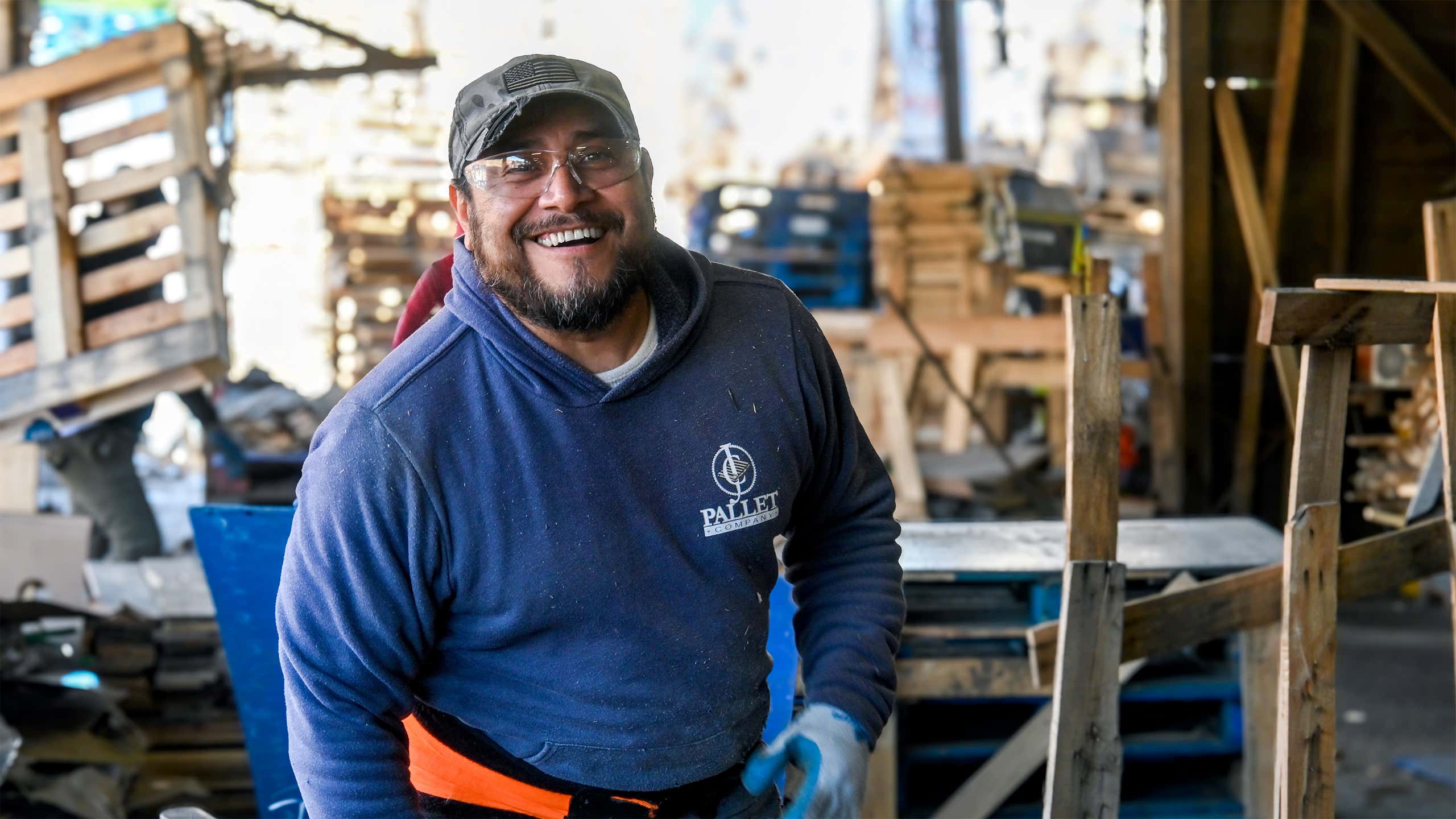 J.C. Pallet team member at work in the pallet yard