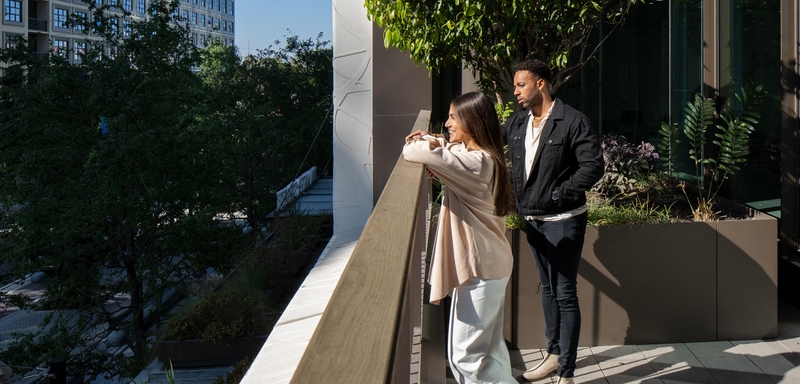 couple on a patio and looking ahead
