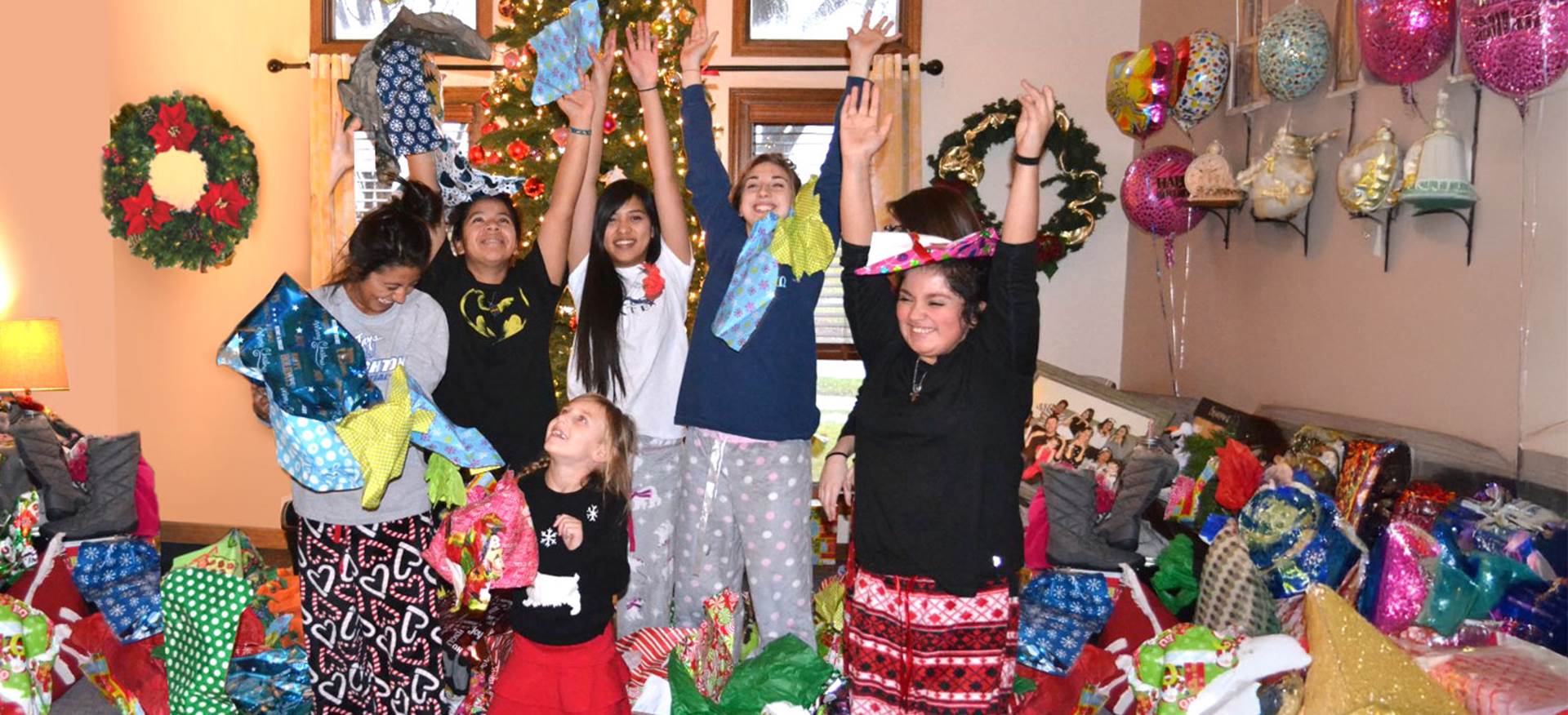 Boys Town kids Opening Presents