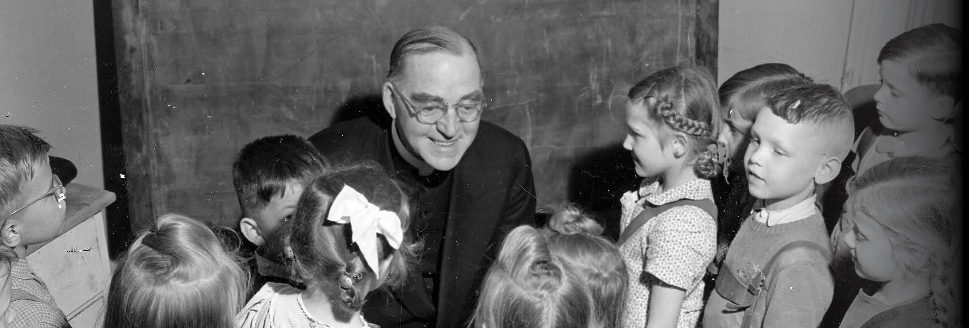 Father Flanagan with kids from Boys Town