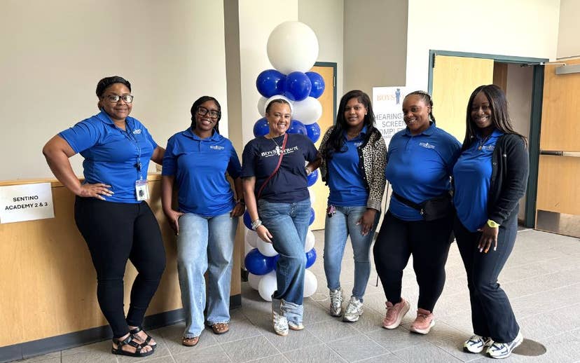 Early head start employees taking a group photo