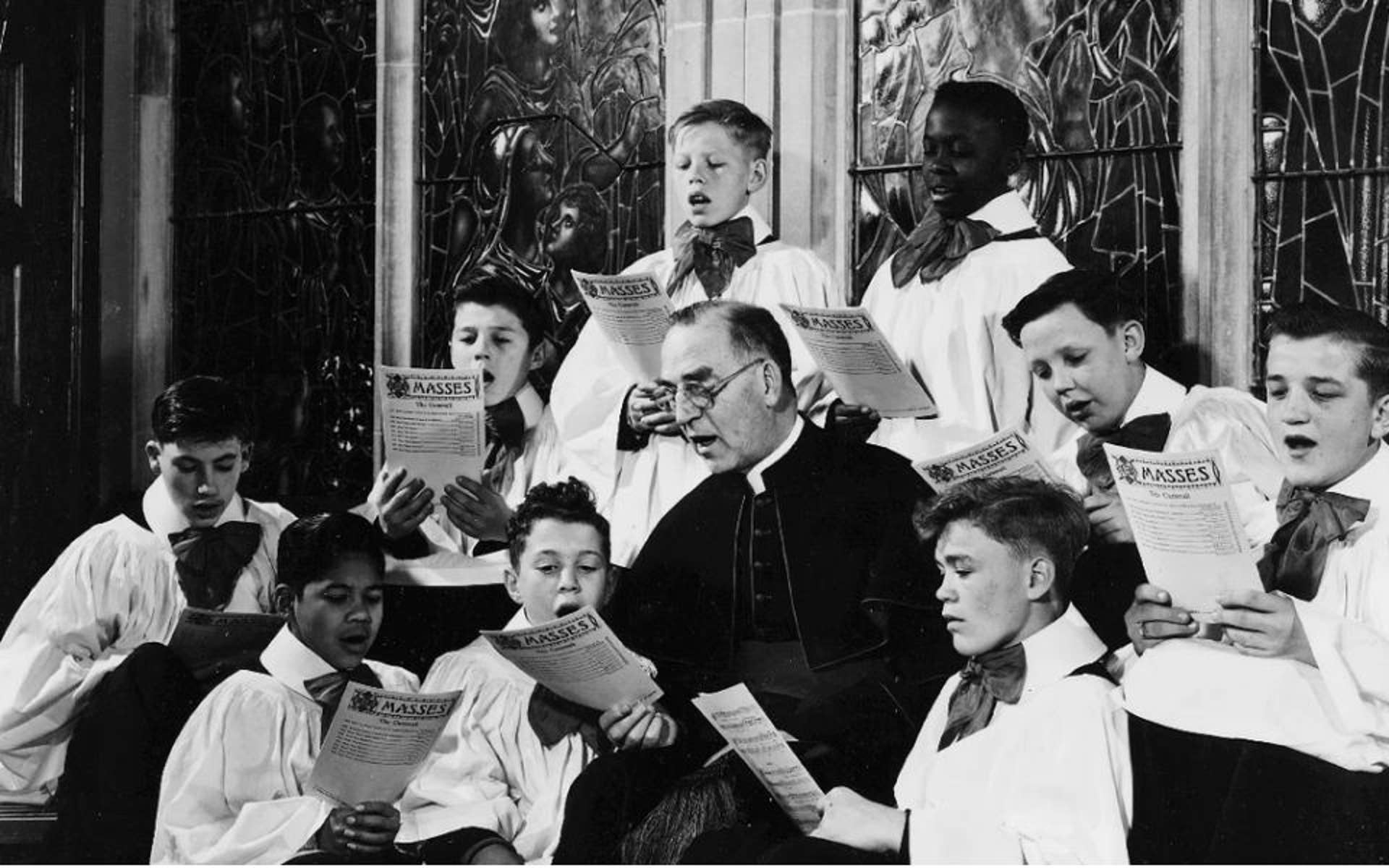 Father Flangan singing with Boys Town Boys
