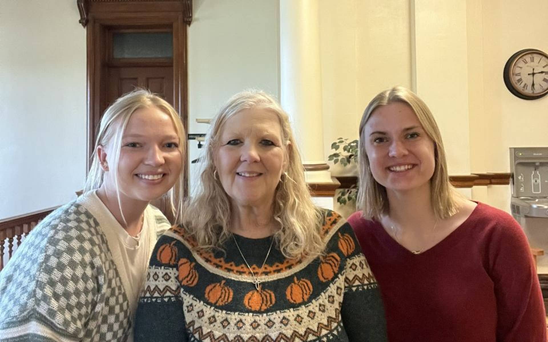 3 smiling Boys Town employees