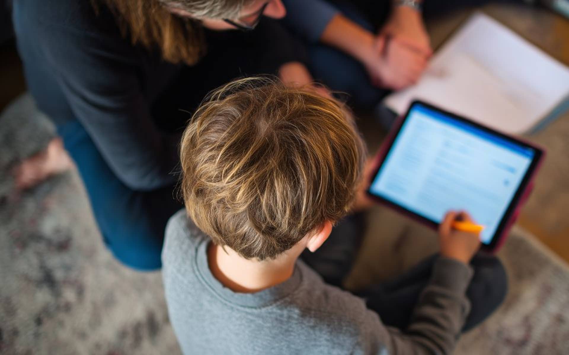 Mom-son-working-on-homework-with-AI