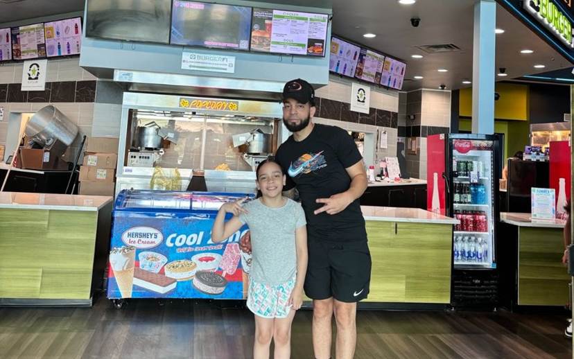 Father and Daughter at Concession stand