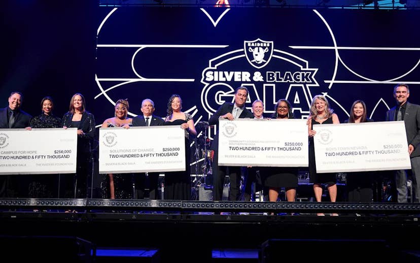Boys Town Nevada accepting donation from Raiders 