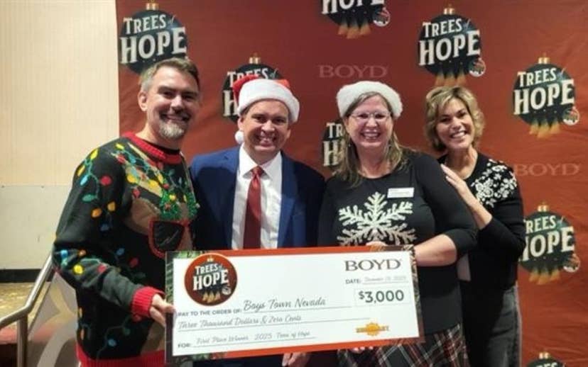 Boys Town Employees Accepting First place winners check