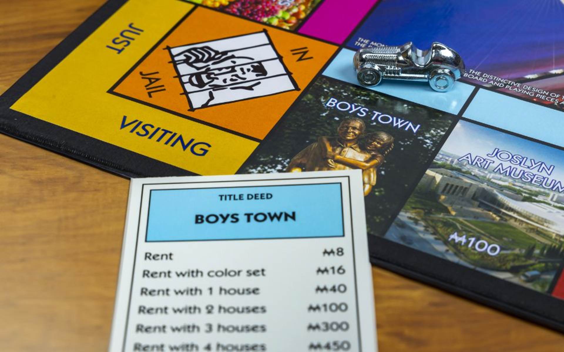 Monopoly Board That is based on Omaha Nebraska Locations and Shows Boys Town as one of the Locations