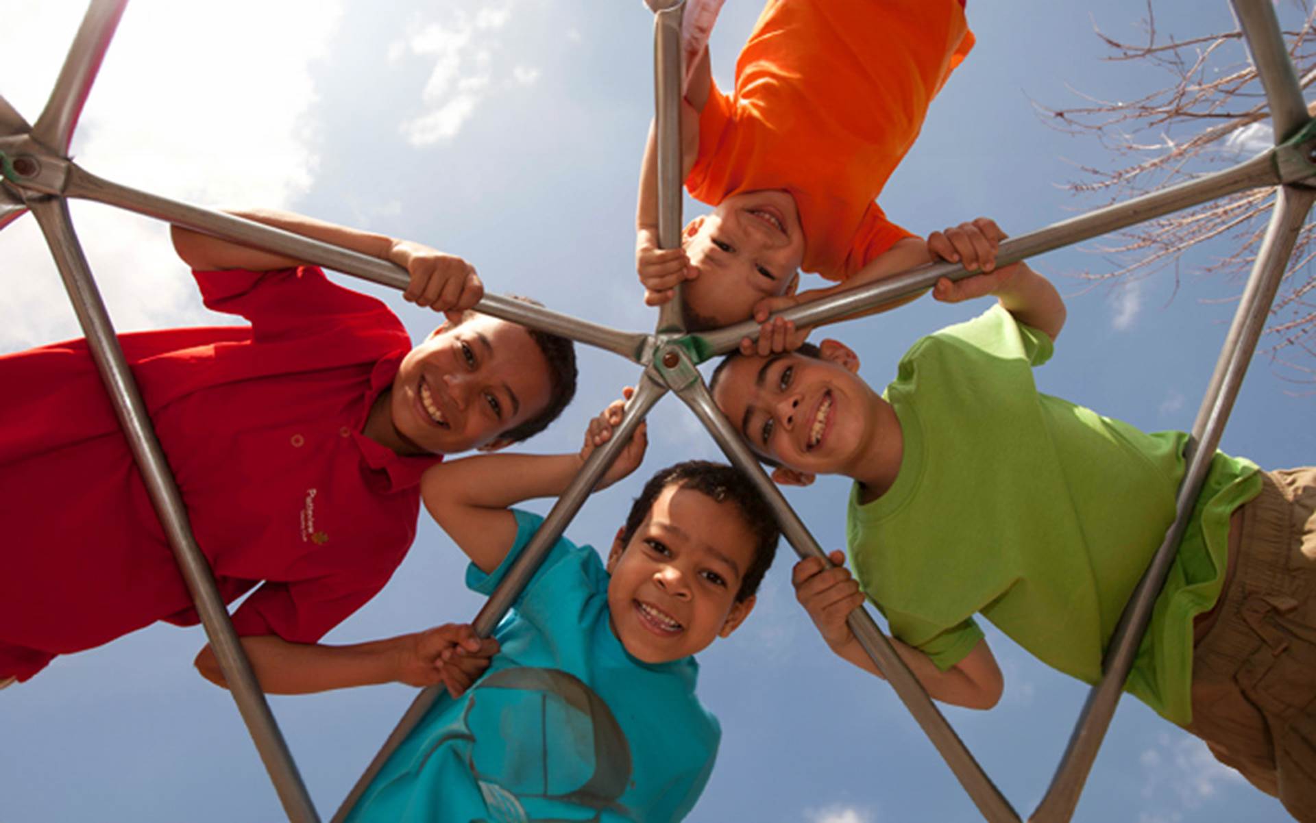 Kids playing on the monkey bars