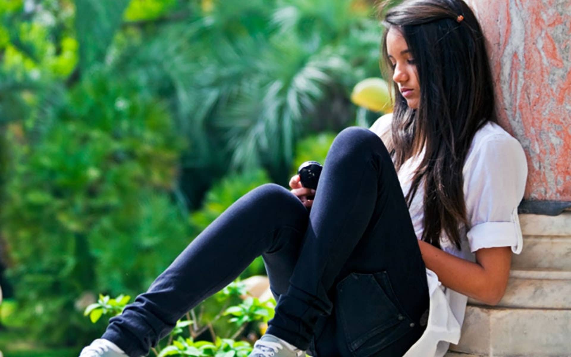 Teen Girl on Phone Alone