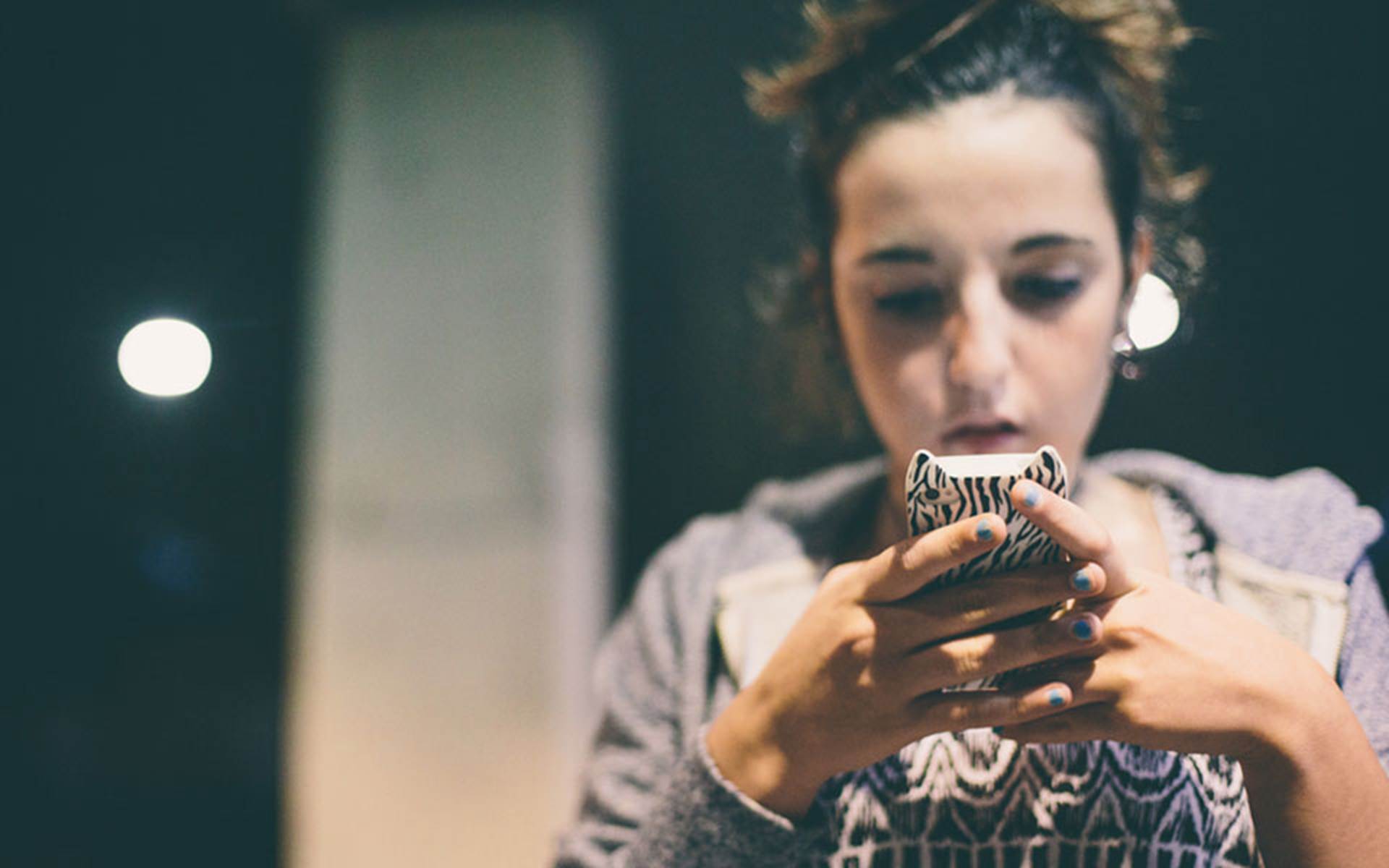 Girl looking at her phone