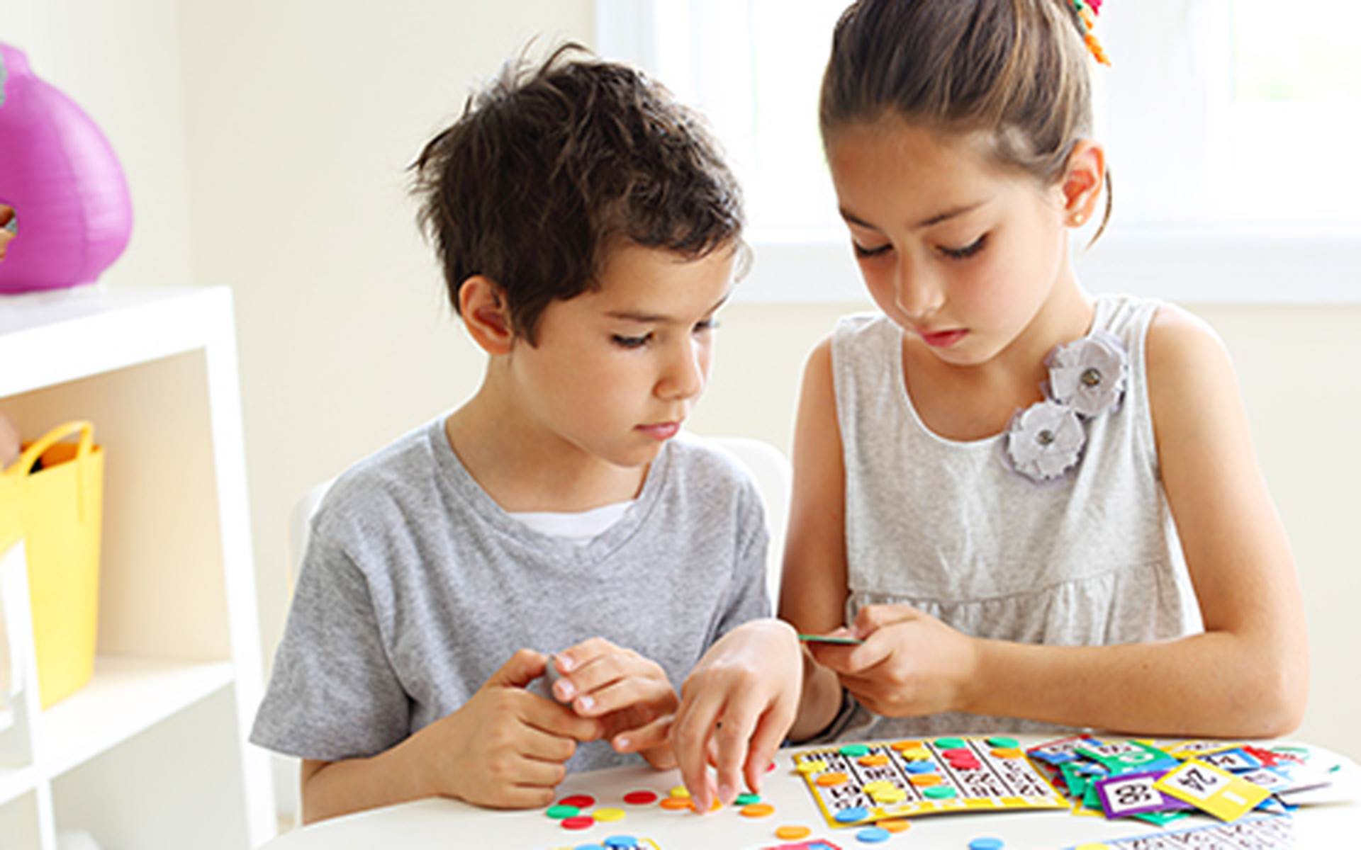 Kids playing a board game