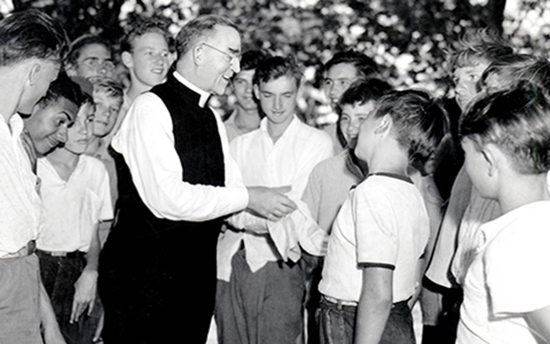 Father Flanagan teaching kids