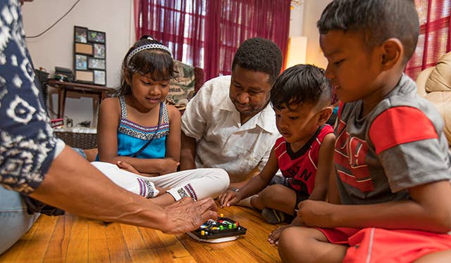 Family playing a game together
