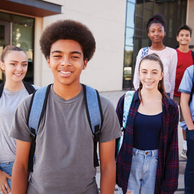 Students smiling outside
