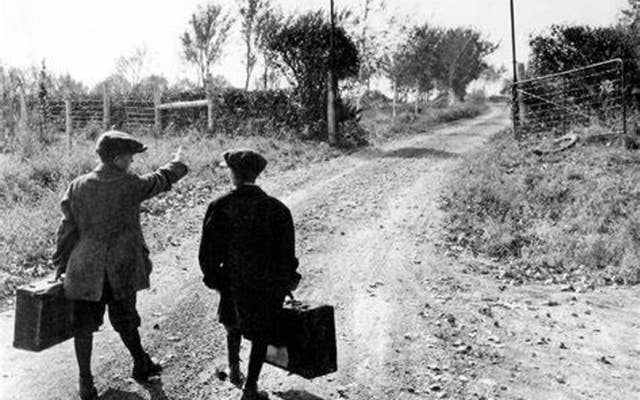 Two young boys traveling