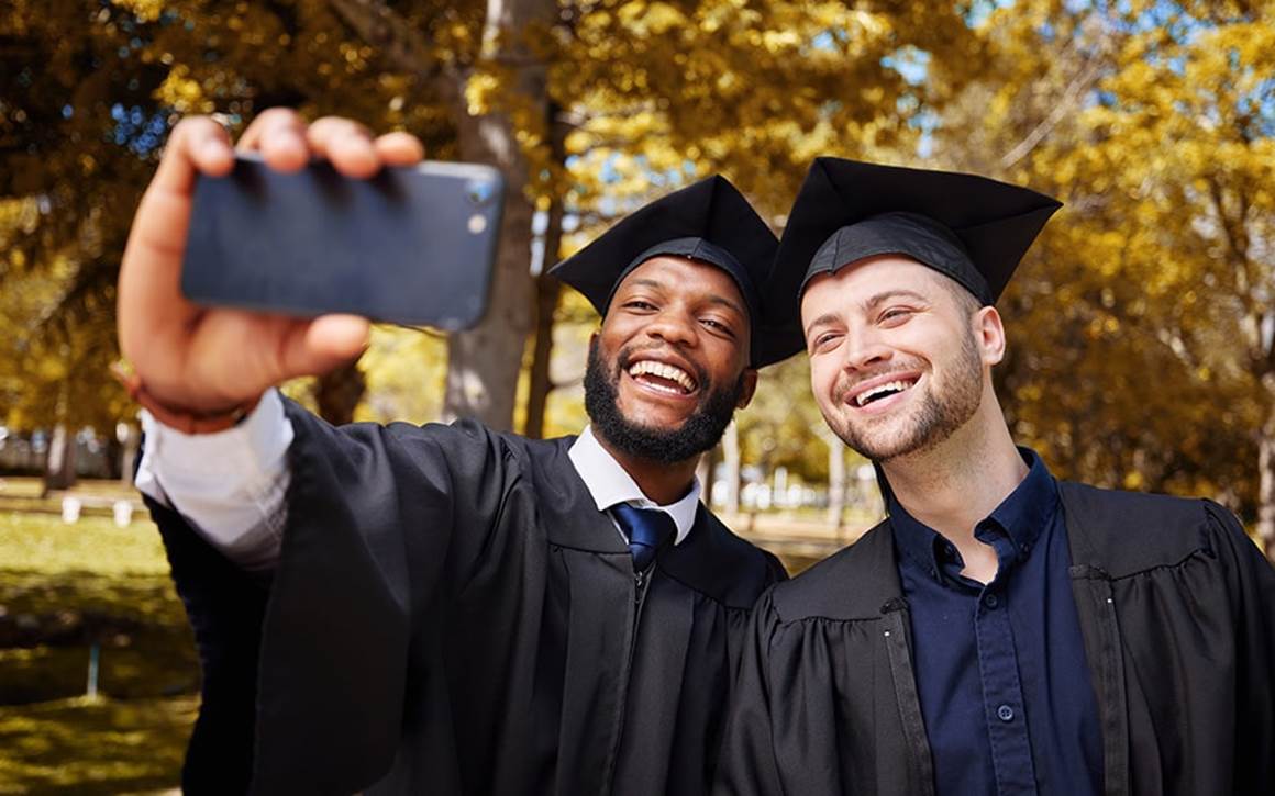 Two Graduates taking a picture