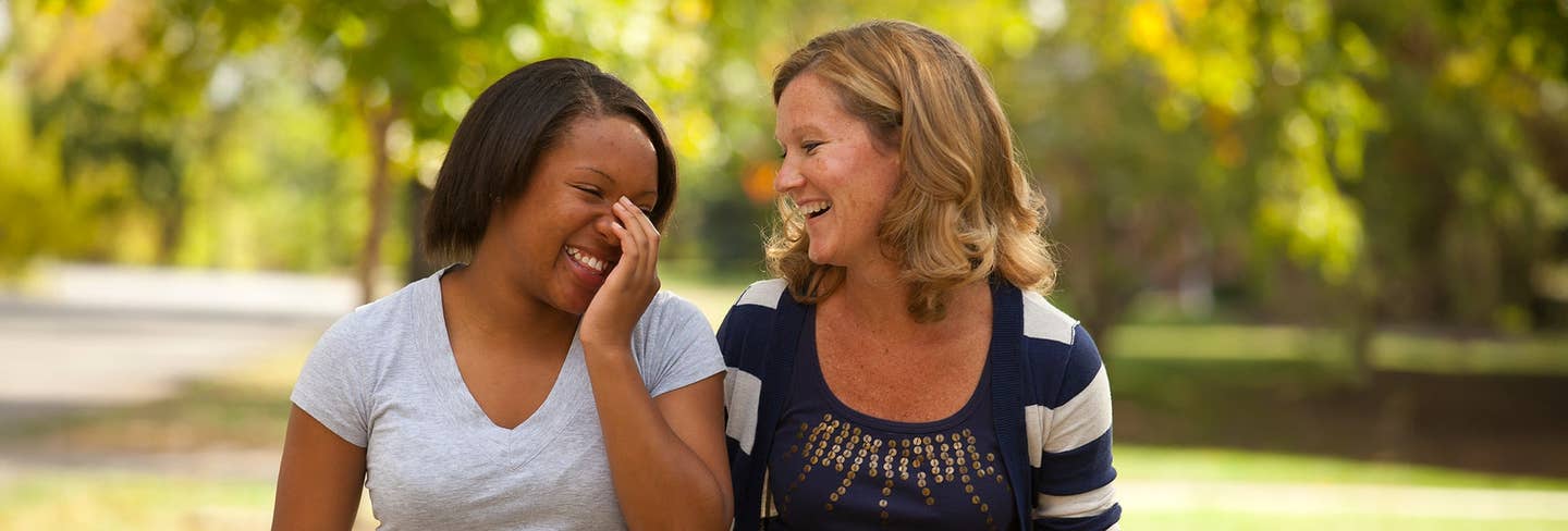 Jodi and youth having a funny conversation