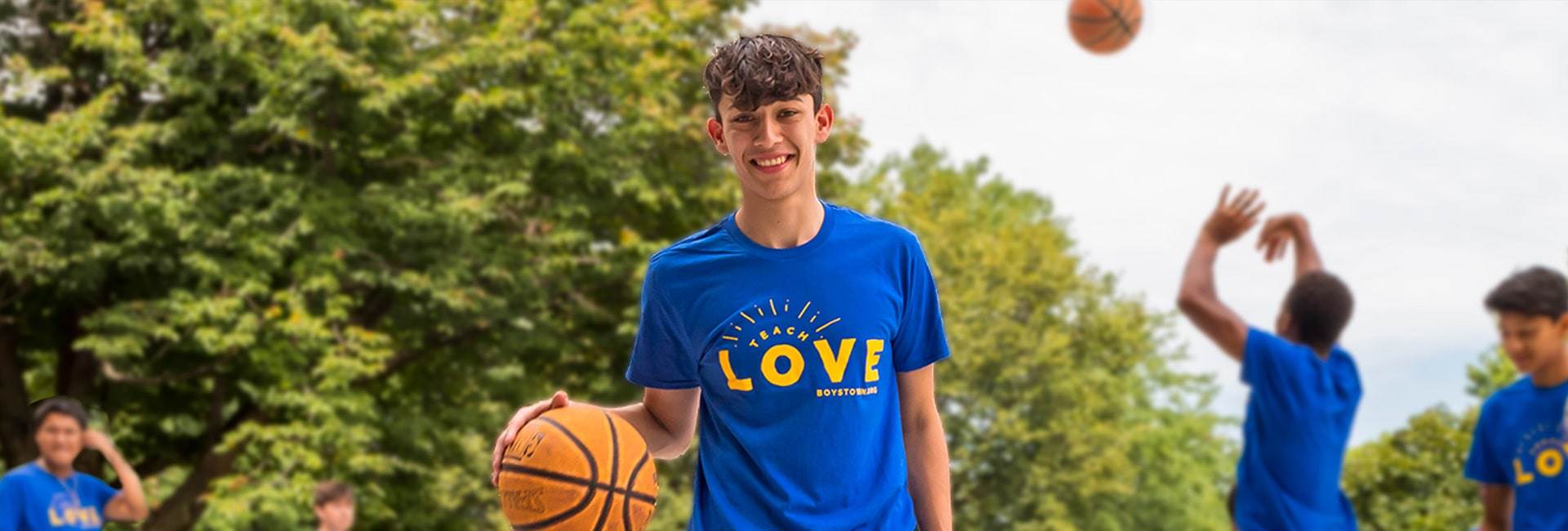 Kids Playing Basketball in Teach Love T-shirts