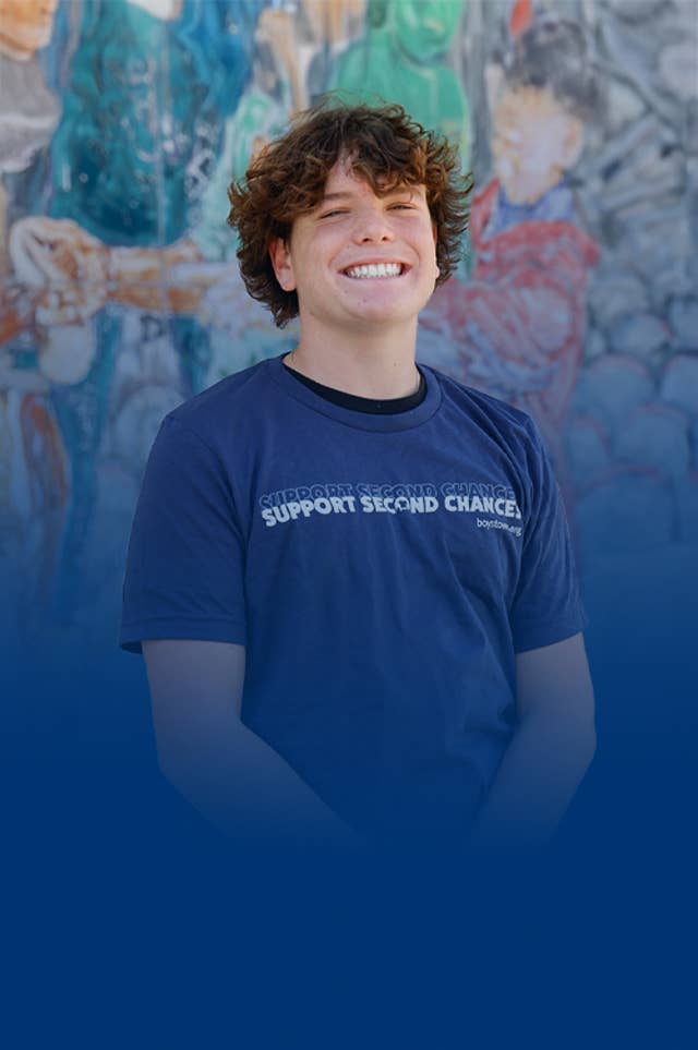 Young man wearing Support Second Chances t-shirt