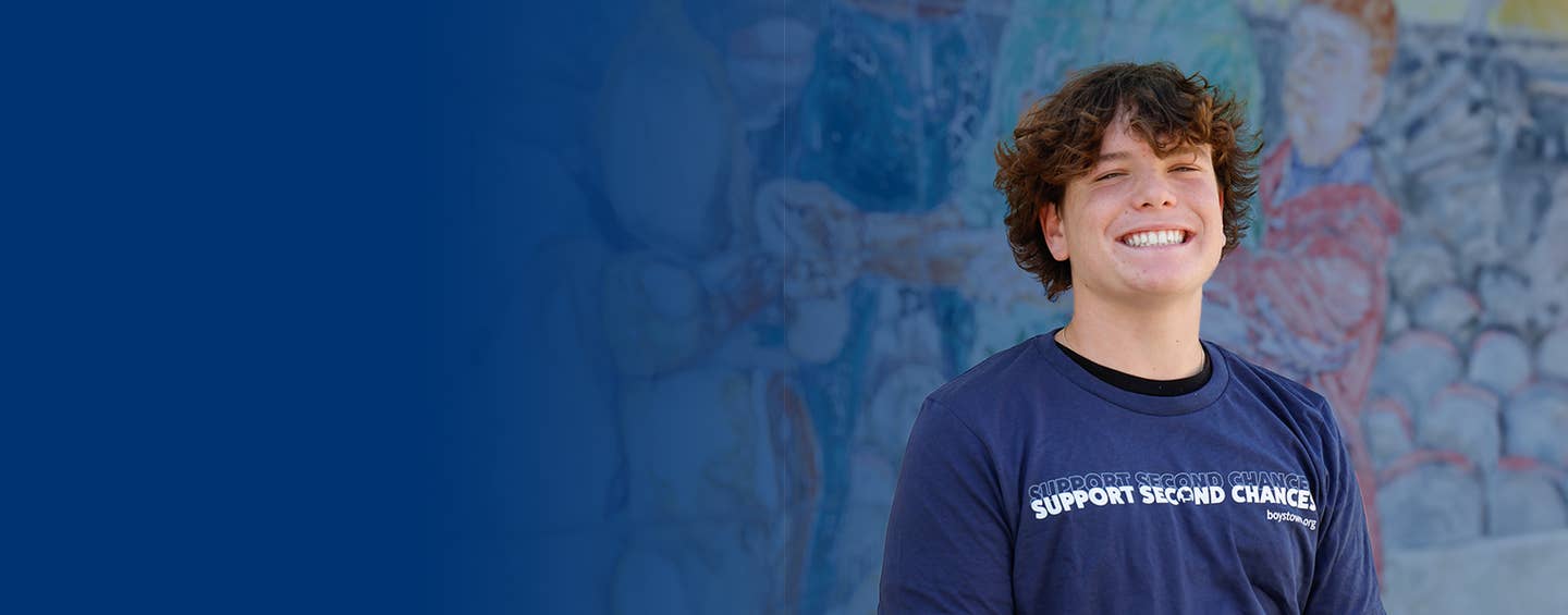 Young man wearing Support Second Chances t-shirt