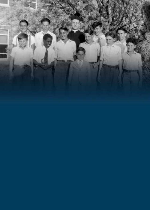 Father Flanagan with students