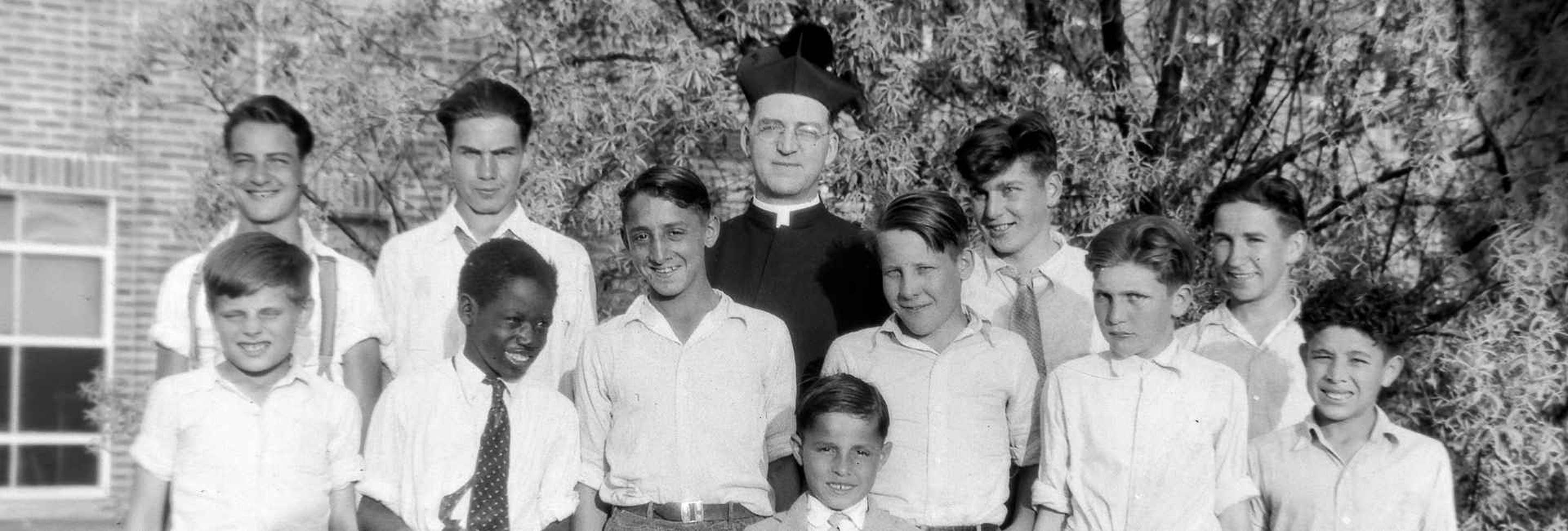 Father Flanagan with students