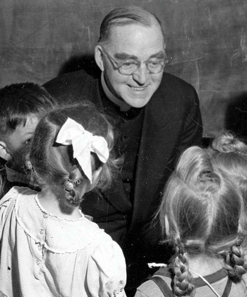 Father Flanagan with kids from Boys Town