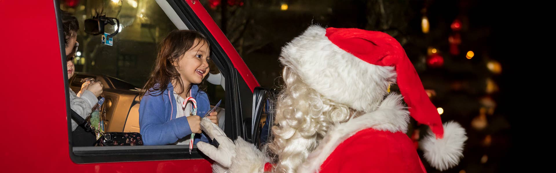 Photo of Santa with young girl