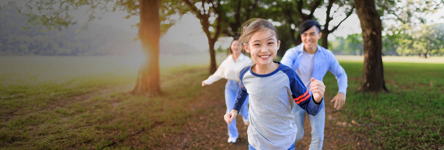 Young kids running outdoors