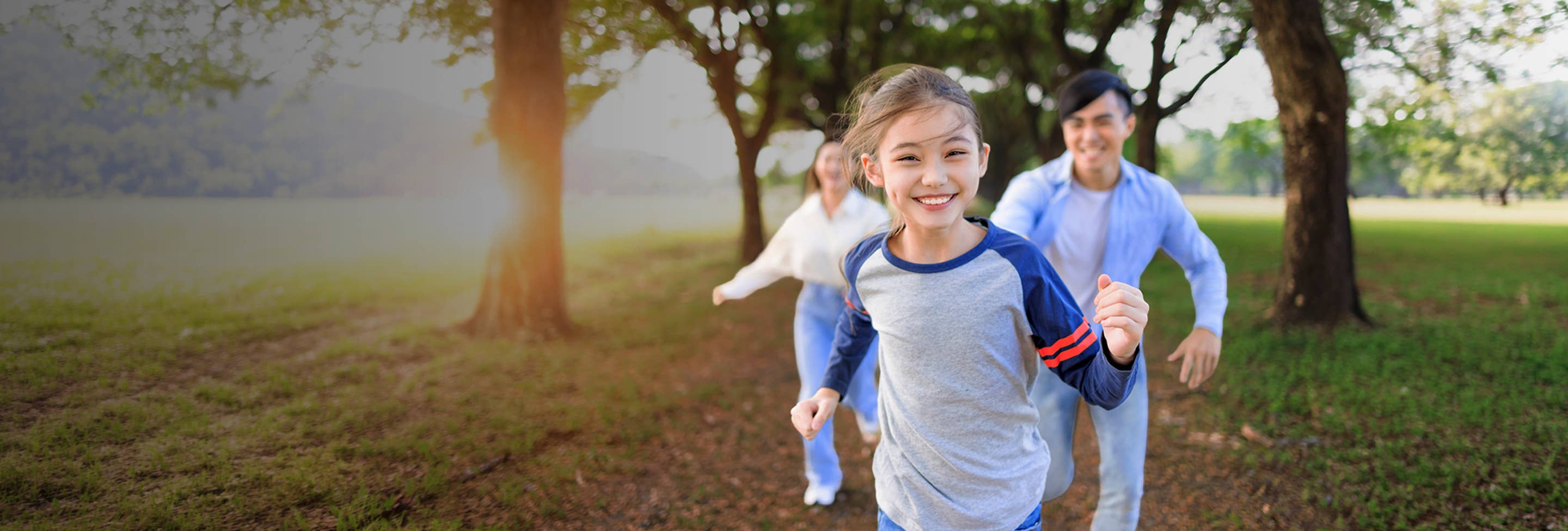 Young kids running outdoors