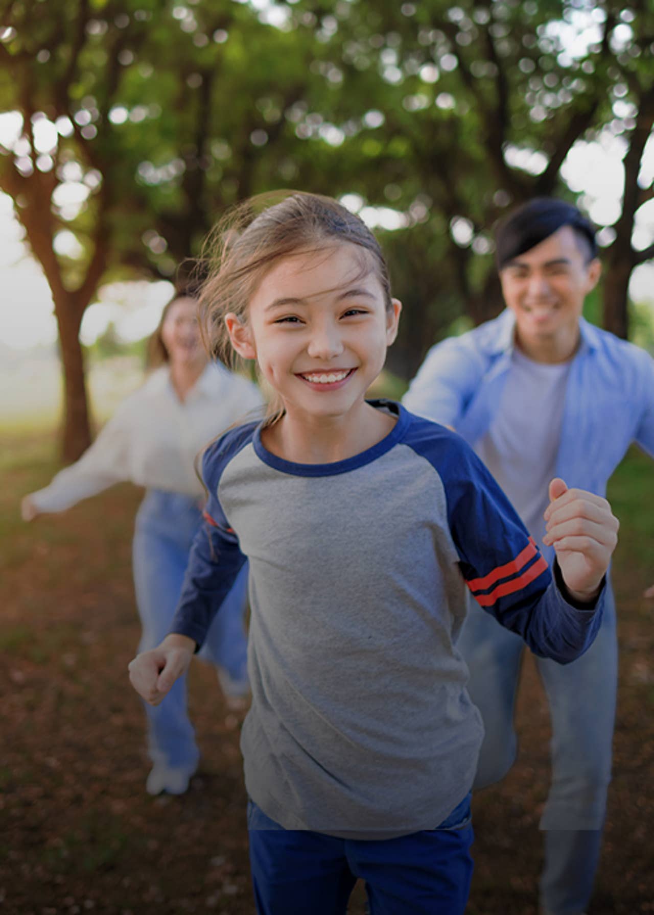 Young kids running outdoors