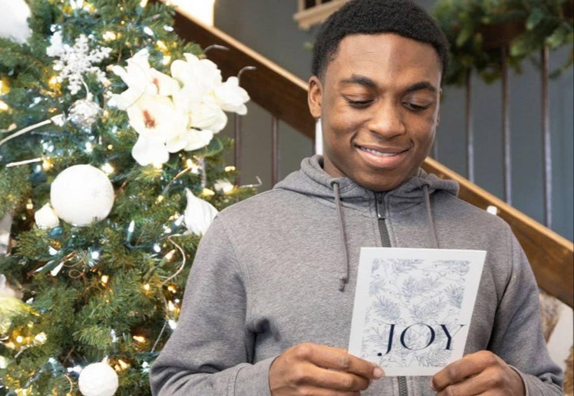 Person looking at holiday card