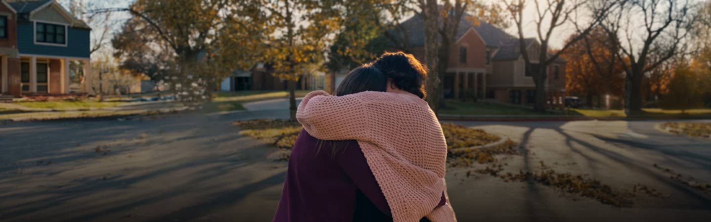 Mother and daughter embracing