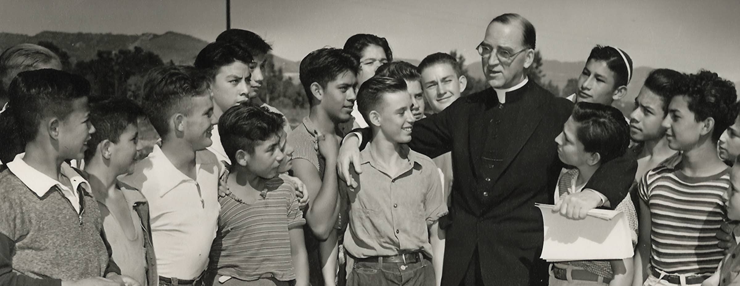 Father Flanagan with a group of children