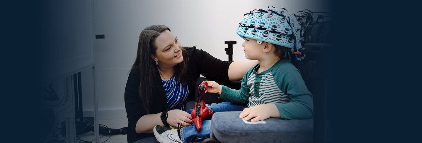 Physician helping young patient