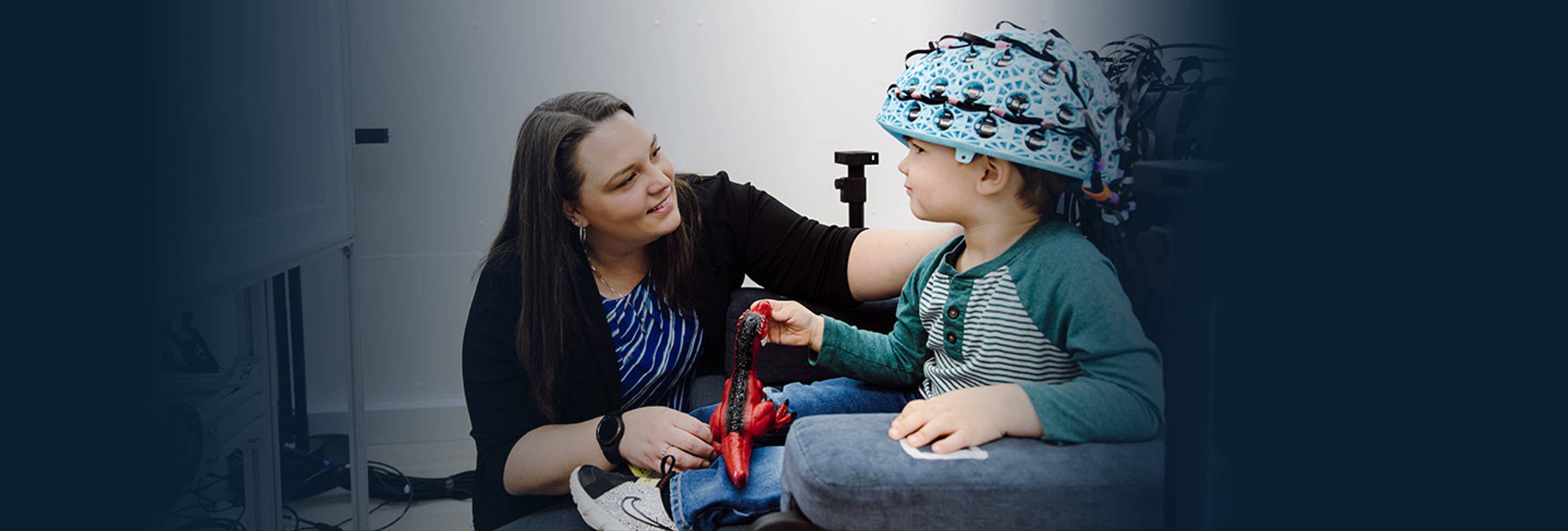 Physician helping young patient