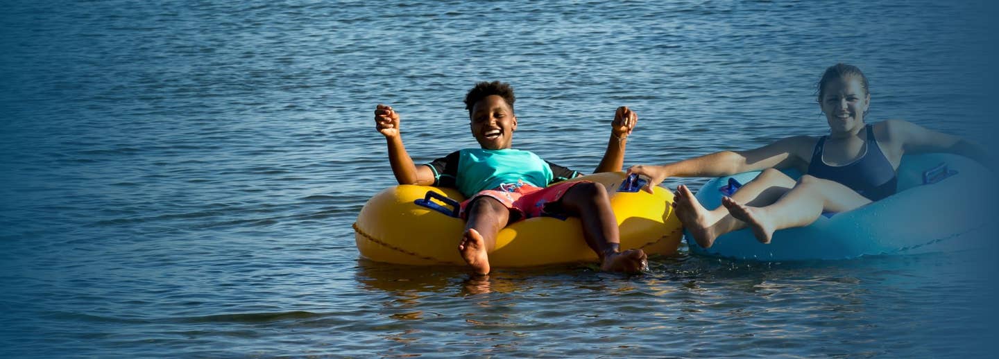 Kids water tubing at Lake Okoboji