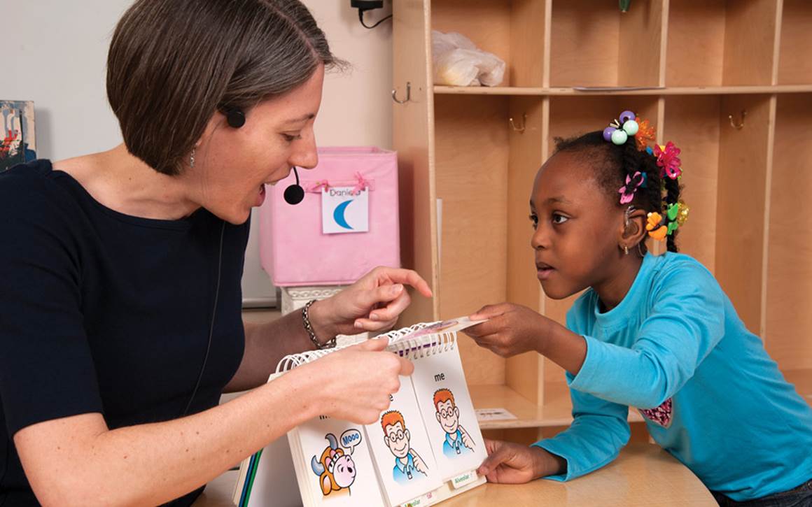 Therapist helping child