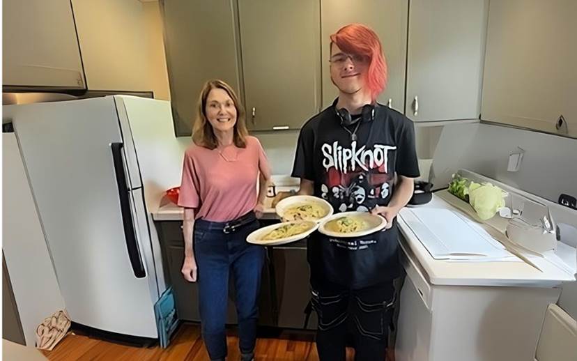 Lisa Johnson with youth creating pesto sauce form the garden