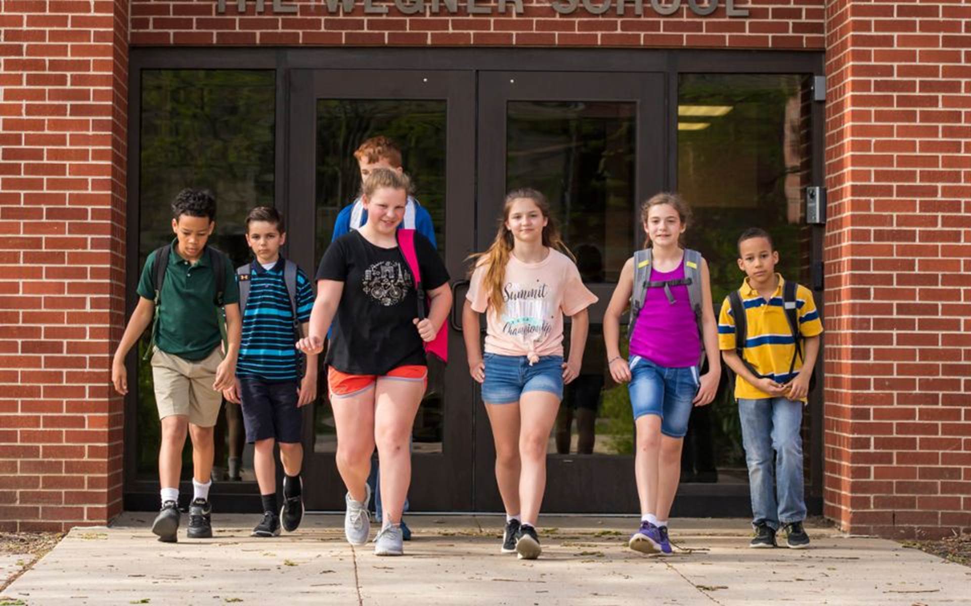 Youth Walking o of School