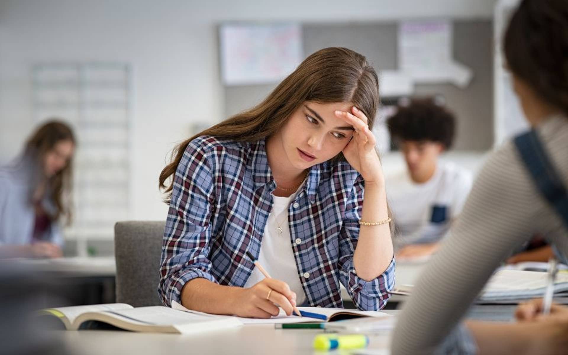 young-teenager-girl-feeling-stressed-at-school