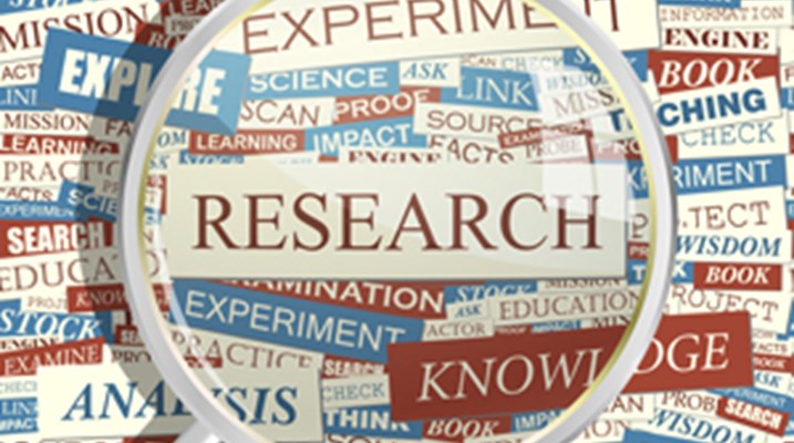 magnifying glass with the work research