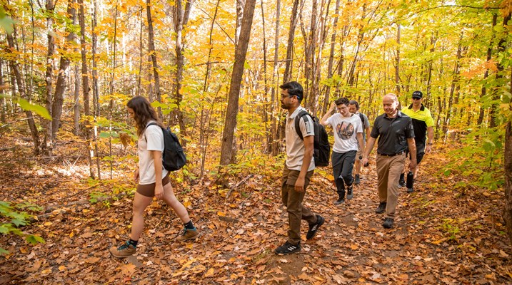 Group of students walking on trails