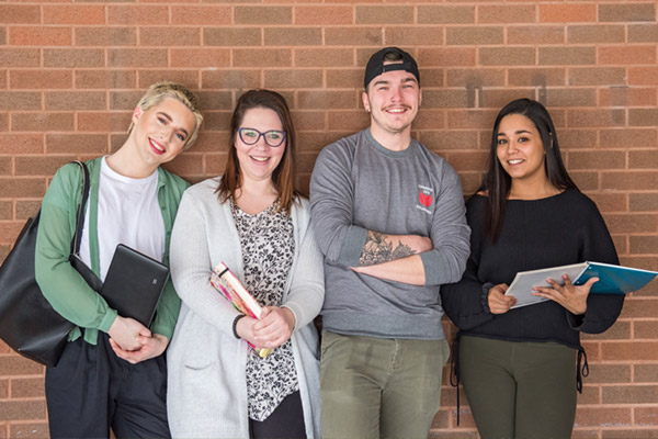 Canadore students smiling.